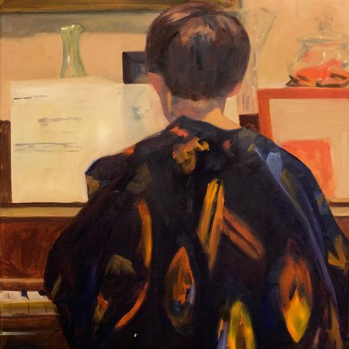 Young Boy at Piano Wearing Hapi Coat